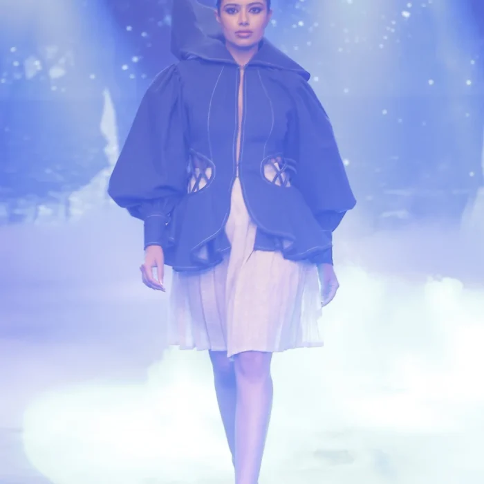 Midnight blue women's hooded denim jacket and pleated skirt co-ord set by Vestito Exclusiva